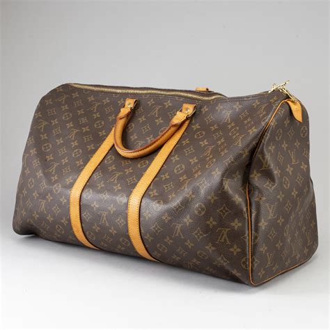 louis vuitton weekend bag fake|Louis Vuitton weekend bag price.